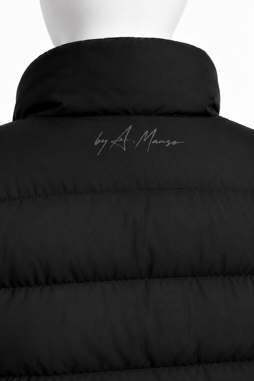 A. Manso black long puffer jacket with loose fit