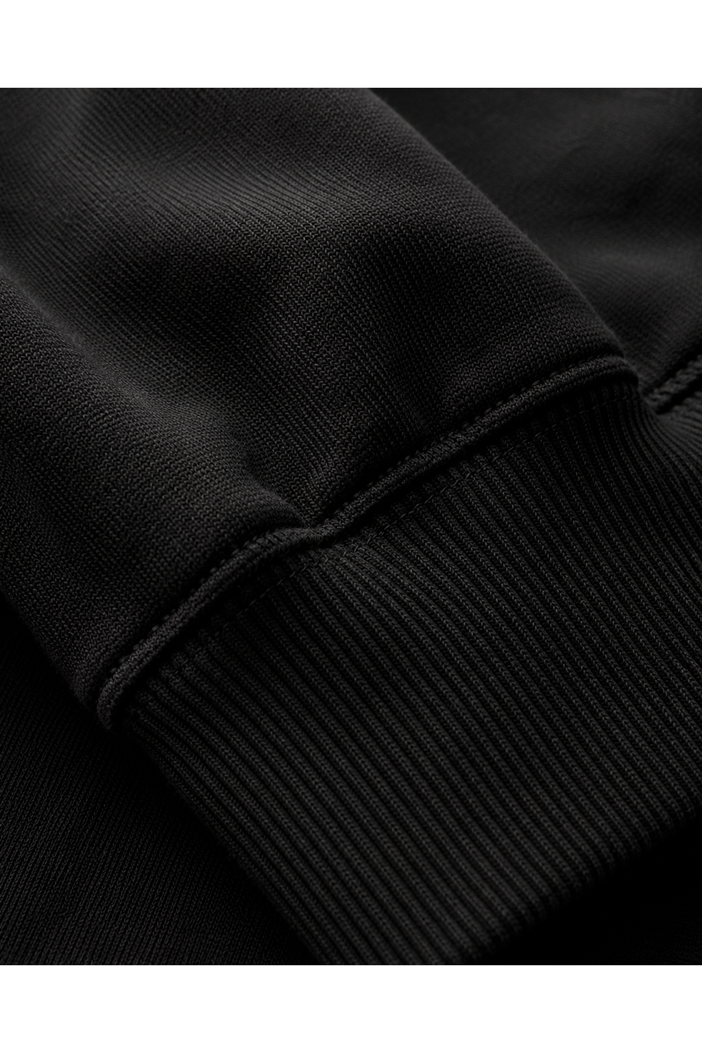 A. Manso black fleece hoodie with relaxed boxy fit