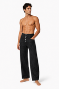 Shirtless barefoot male model wearing BUTTON-FRONT WIDE-LEG DENIM 001 by A. Manso, front view