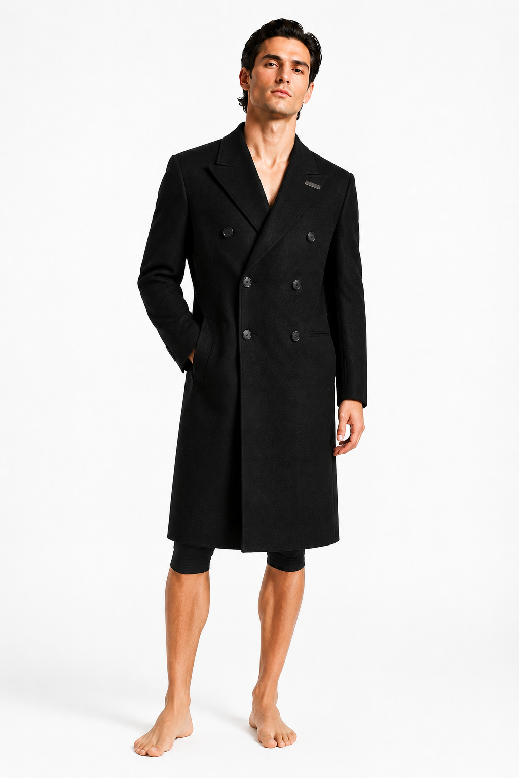 Male editorial model wearing DOUBLE-BREASTED OVERCOAT 000 by A. Manso — front view