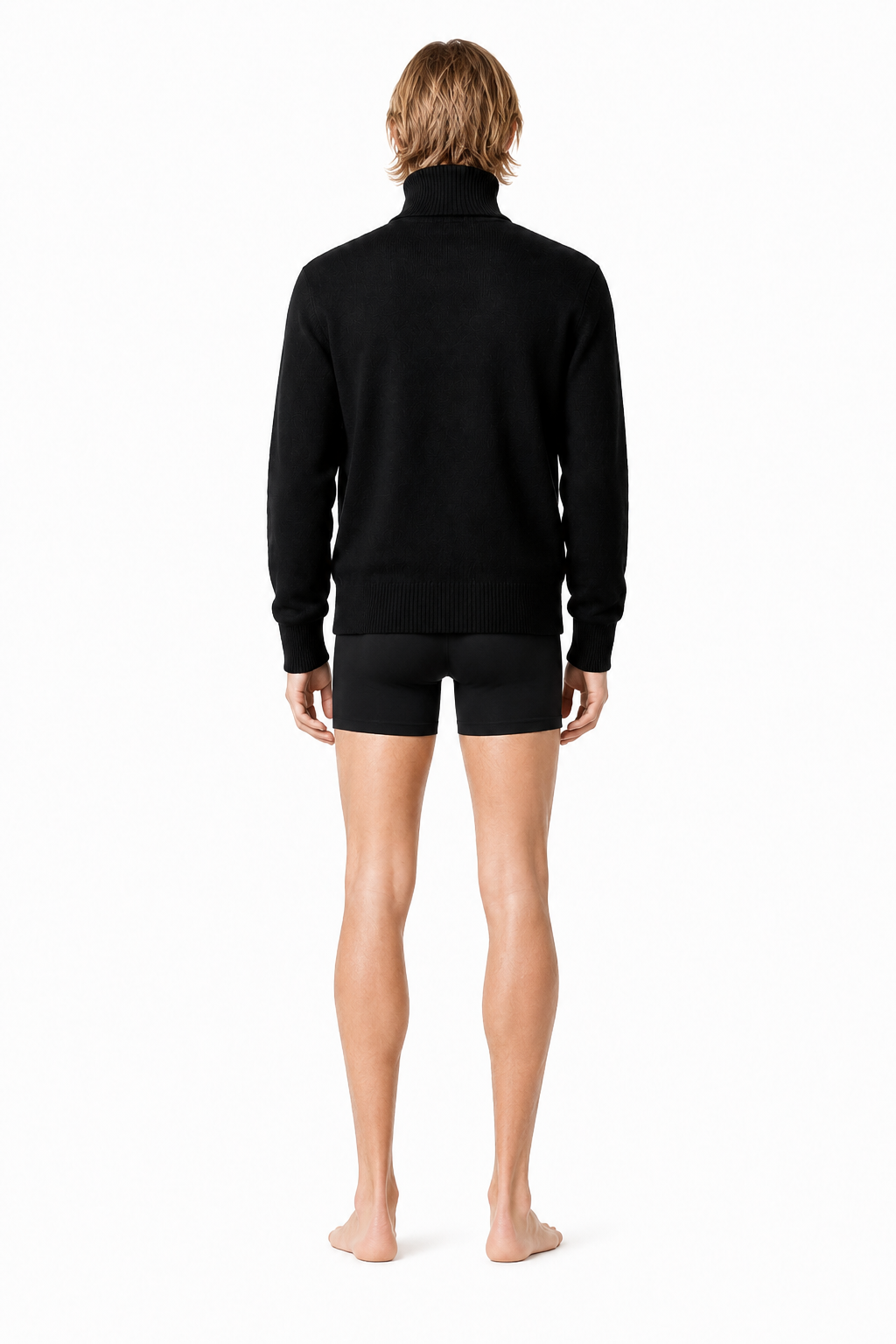 Male editorial model wearing HIGH-NECK KNIT 000 by A. Manso — three-quarter view