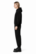 Male editorial model wearing UTILITY STAYS QUIET by A. Manso — front view