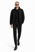 Male editorial model wearing VOLUME REQUIRES CONTROL by A. Manso — front view
