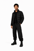 Male editorial model wearing WINTER IS NOT A DESIGN EXCUSE by A. Manso — front view