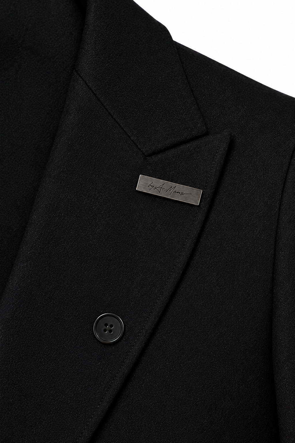 DOUBLE-BREASTED OVERCOAT 000 A. Manso lapel signature hardware detail