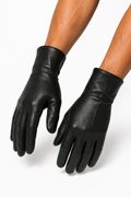 LEATHER GLOVES 000 worn on male hands — editorial detail