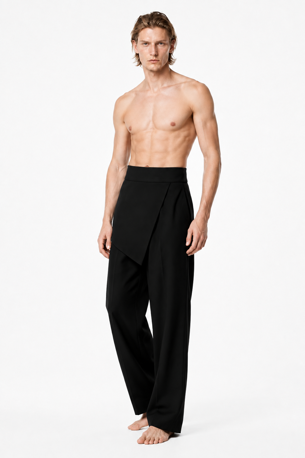 Shirtless barefoot male model wearing WRAP TROUSERS 000 by A. Manso, three-quarter view